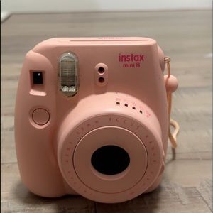 Pink Polaroid comes with NO film